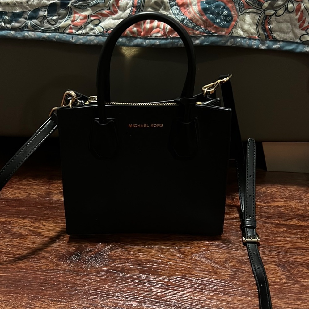 MICHAEL KORS USED A FEW TIMES